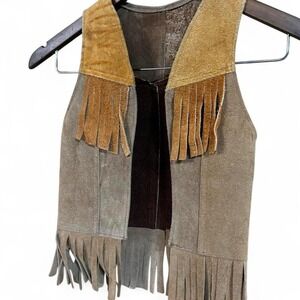 Brown and tan fringe leather/ suede vest. Double D Ranch vibes, western must